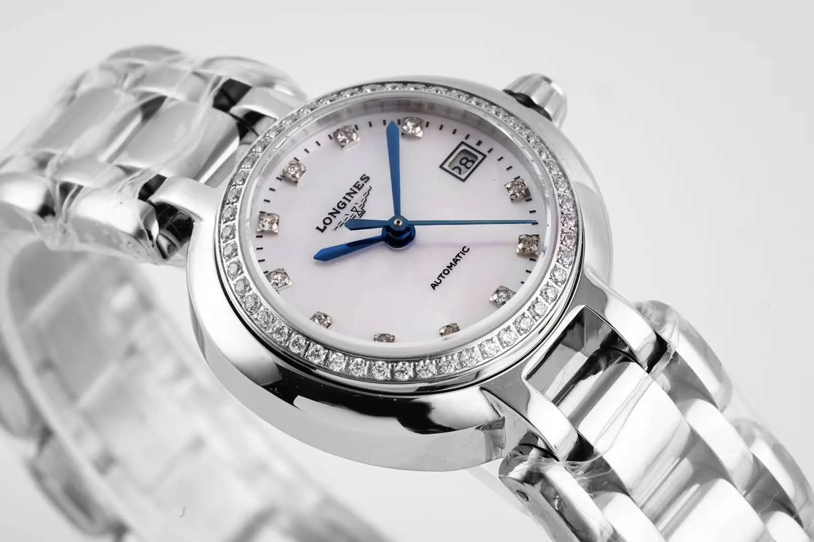 Primaluna quadrante MOP bianco con indici con diamanti e lunetta con diamanti - immagine 4
