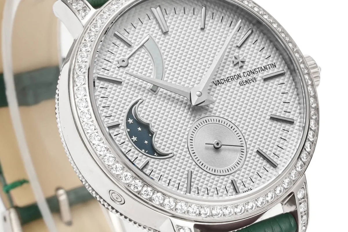 Traditionelle Moon Phase White Dial with Diamond Bezel in White Gold on Green Leather Strap